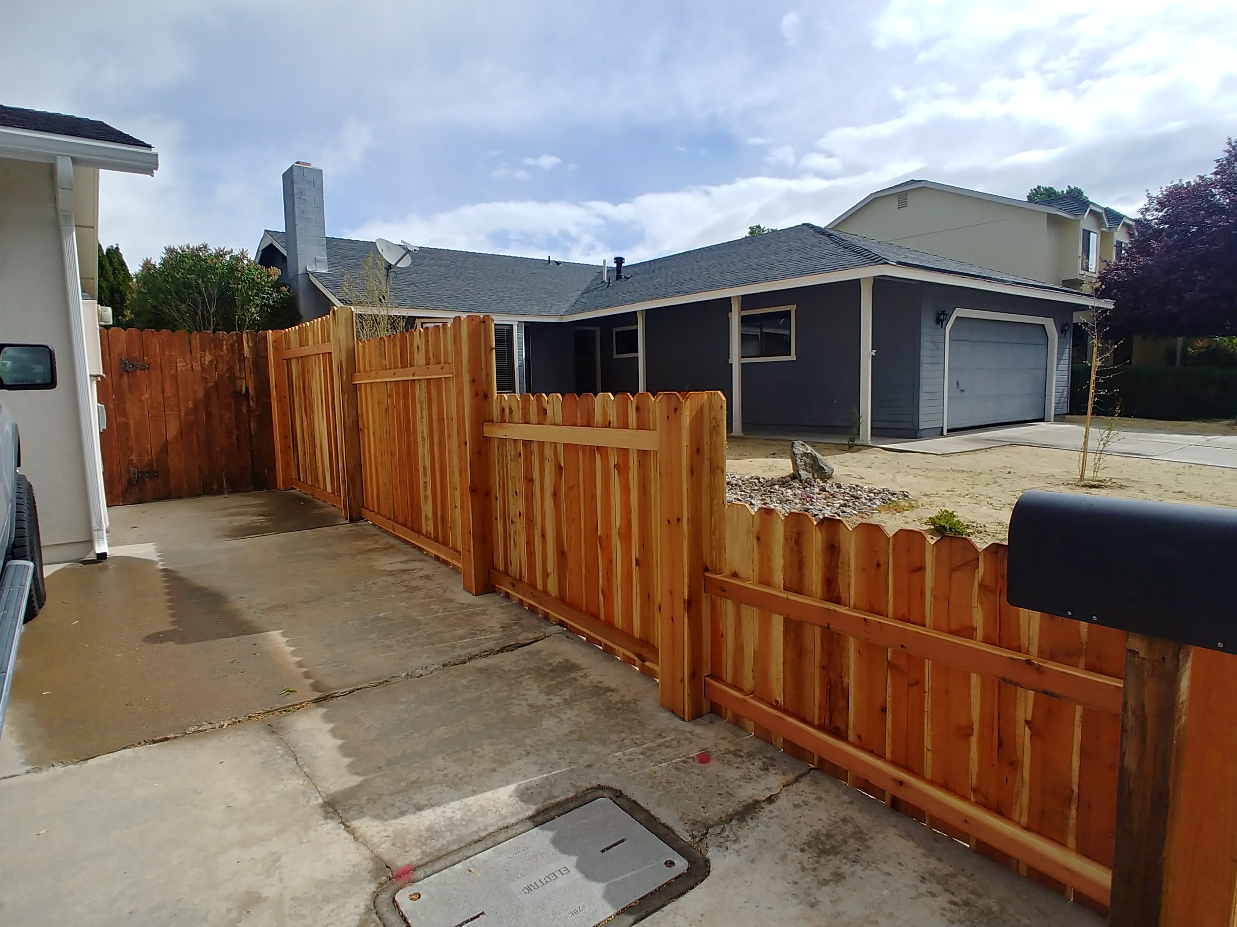 picture of wooden fencing in front of a house